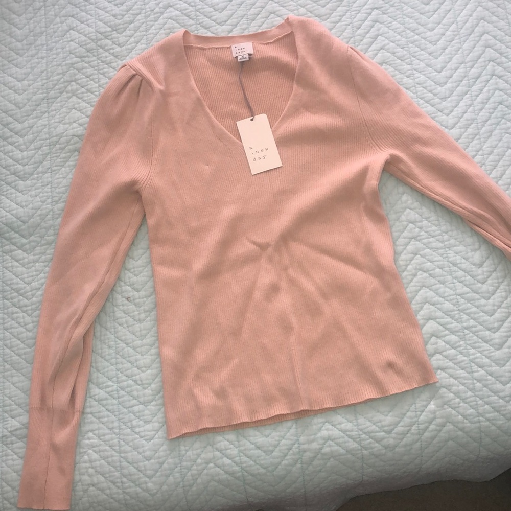 cream , blush sweater